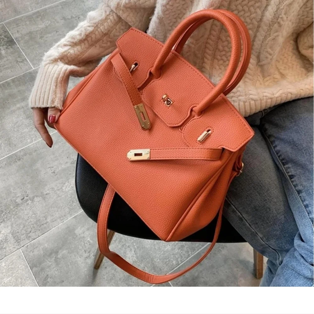 Structured Orange Leather Top-Handle Satchel with Gold-Tone Hardware